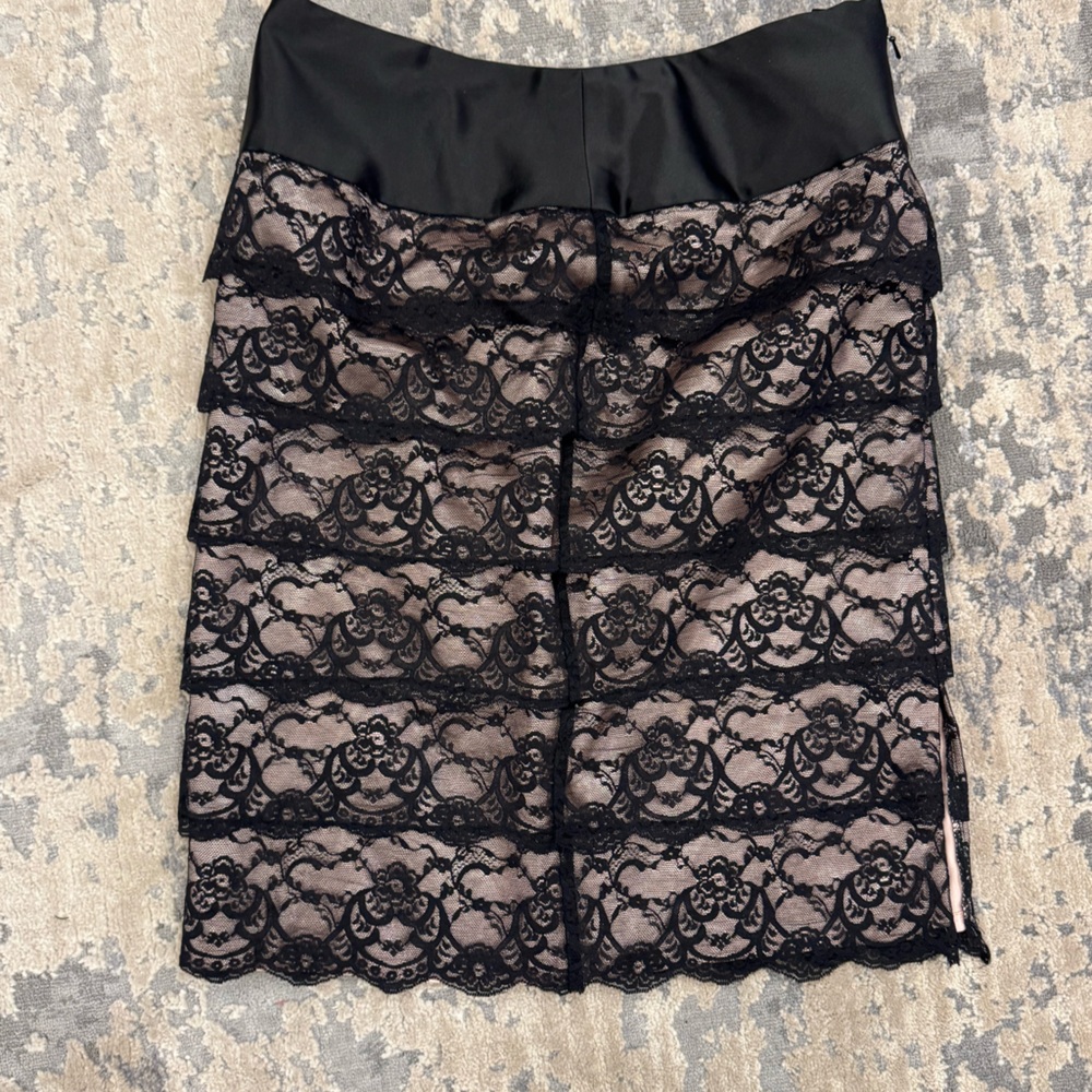 Fancy detailed scallop skirt.